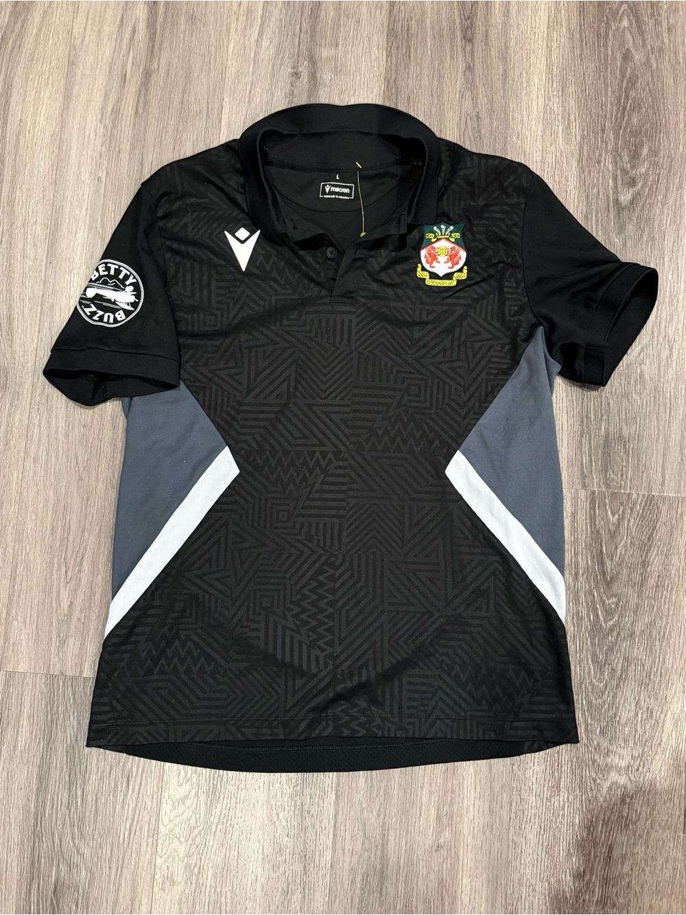 Macron Black Wrexham Polo Shirt with Crest